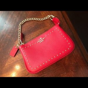 Coach! Sexy little red and gold mini purse.